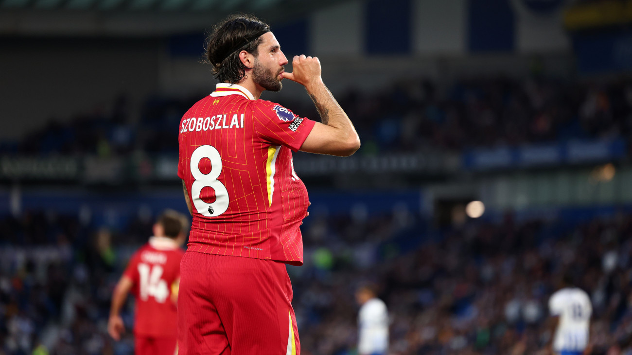 BRIGHTON, ENGLAND - MAY 19:Dominik Szoboszlai of Liverpool celebrates after he scored for 1-2  during the Premier League match between Brighton & Hove Albion FC and Liverpool FC at Amex Stadium on May 19, 2025 in Brighton, England. (Photo by Shaun Brooks - CameraSport via Getty Images)