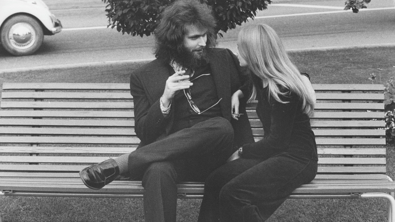 Clark Olofsson. Swedish criminal born 1947. A Swedish criminal now living in Belgium. He has received sentences for attempted murder, assault, robbery, and dealing narcotics and has spent more than half of his life in correctional institutions in Sweden. Olofsson has been called Swedens first celebrity gangster. Olofsson was present at the Norrmalmstorg robbery whose events resulted in the creation of the phrase Stockholm syndrome to describe them. Picture taken 1974 when he was serving a jail sentence for the robbery of Krediitbanken at Norrmalmstorg Stockholm, in NorrkĂśping and meets with his girlfriend Maria outside the prison gates. On march 20 1975 Olofsson escaped from this prison On 11 May 2020, Netflix announced Clark - a six episode drama series about Clark Olofsson. Olofsson will be played by Bill SkarsgĂĽrd and Jonas Ăkerlund will be directing. (Photo by Sjöberg Bildbyrå/ullstein bild via Getty Images)