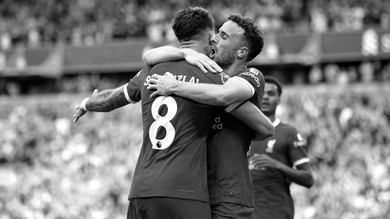 Liverpools Diogo Jota celebrates scoring their sides third goal of the game with team-mate Dominik Szoboszlai during the Premier League match at Anfield, Liverpool. Picture date: Saturday August 19, 2023. (Photo by Peter Byrne/PA Images via Getty Images)