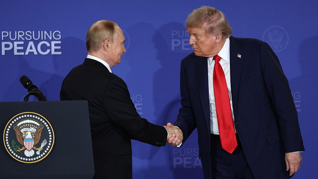 ALASKA, UNITED STATES - AUGUST 15 : (----EDITORIAL USE ONLY - MANDATORY CREDIT -  KREMLIN PRESS OFFICE / HANDOUT - NO MARKETING NO ADVERTISING CAMPAIGNS - DISTRIBUTED AS A SERVICE TO CLIENTS----) US President Donald Trump and his Russian counterpart, Vladimir Putin, hold a joint press conference after their critical talks in Alaska Friday, aimed at bringing an end to the Kremlins over-three-year war on Ukraine in Anchorage, Alaska, United States on August 15, 2025. (Photo by Kremlin Press Office/Anadolu via Getty Images)