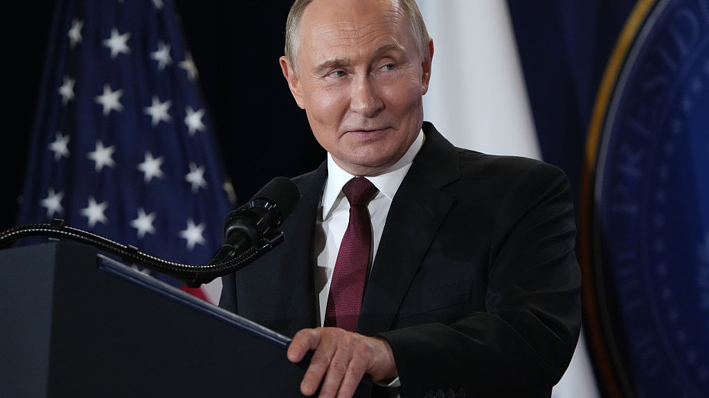ANCHORAGE, ALASKA - AUGUST 15: Russian President Vladimir Putin delivers a statement during a press conference with U.S. President Donald Trump at Joint Base Elmendorf-Richardson on August 15, 2025 in Anchorage, Alaska. The two leaders are meeting for peace talks aimed at ending the war in Ukraine. (Photo by Andrew Harnik/Getty Images)