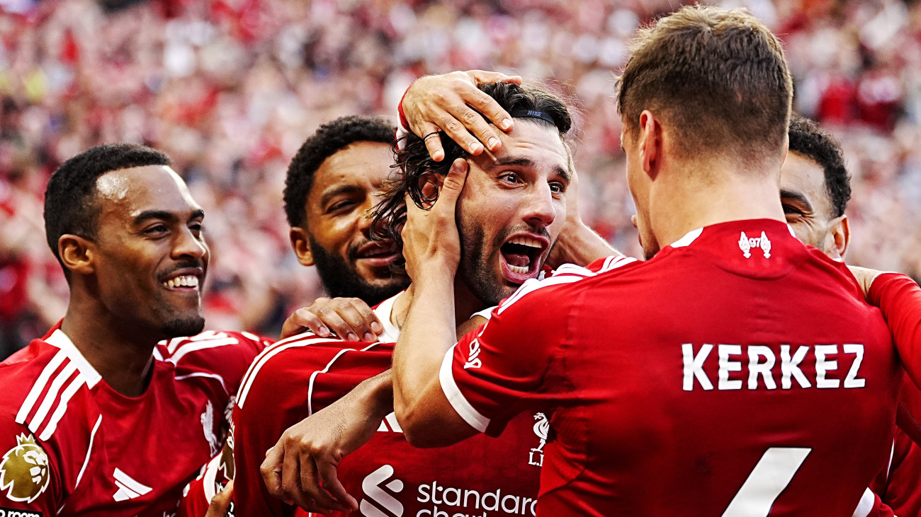 Liverpools Dominik Szoboszlai (centre right) celebrates scoring their sides first goal with team-mates during the Premier League match at Anfield, Liverpool. Picture date: Sunday August 31, 2025. (Photo by Peter Byrne/PA Images via Getty Images)
