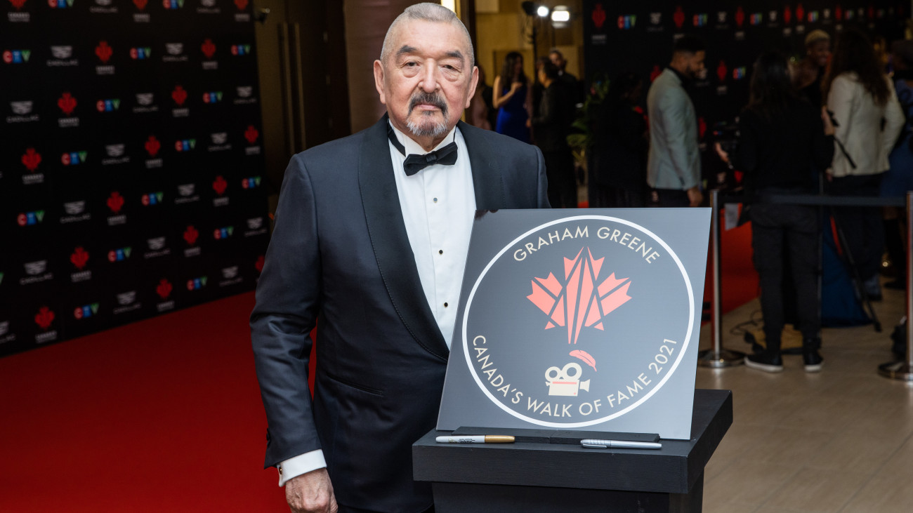 TORONTO, ONTARIO - DECEMBER 03: Graham Greene attends the unveiling of his Canadaâs Walk of Fame 2021 commemorative plaque for Arts & Entertainment during the 2022 Canadas WalkÂ of Fame Gala at Beanfield Centre, Exhibition Place on December 03, 2022 in Toronto, Ontario. (Photo by Mathew Tsang/Getty Images)