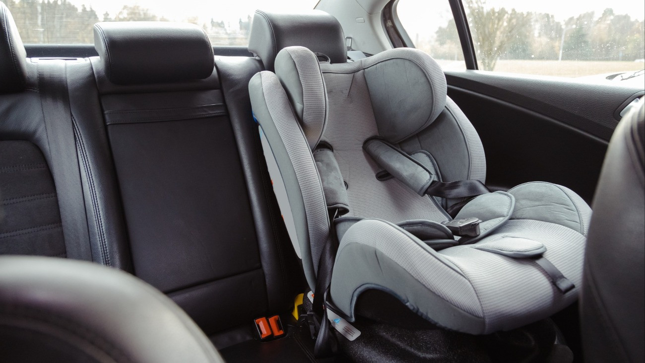 Child car seat for safety in the rear passenger seat of a car.