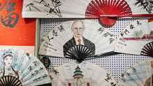 Putyin Pekingbe repült