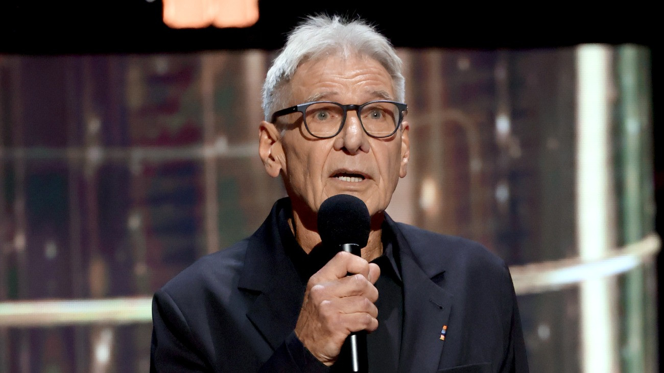 ANAHEIM, CALIFORNIA - AUGUST 16: Harrison Ford speaks onstage at the Disney Entertainment Showcase at D23: Legends on August 16, 2026 in Anaheim, California. (Photo by Kevin Mazur/Getty Images for Disney)